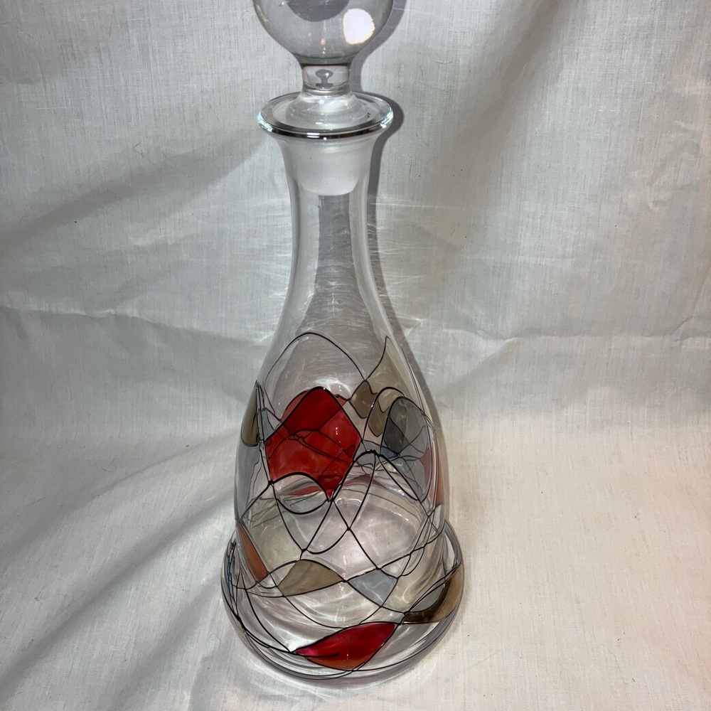 Vintage Stained Glass Wine Decanter With Stopper. Silver, blue, red with black.